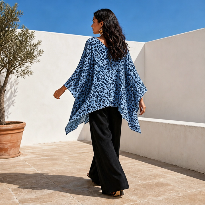 Rivena – Leopard-Print Batwing Top with Asymmetrical Hem + 50% OFF